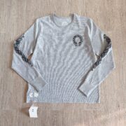 Chrome White long-sleeved top with floral pattern on both arms