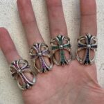 Hollowed-out cross endless ring