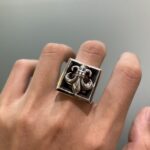 Openwork floral military ring