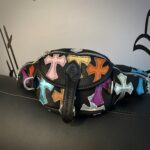 Small colored leather cross-stitch waist bag