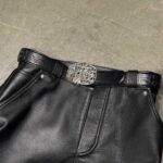 Tomb belt buckle